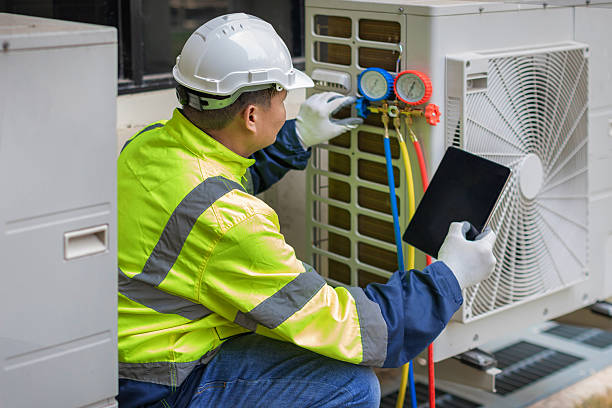 Professional Hvac technician working in Dover, DE
